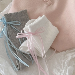 Detailed view of ribbons and ruffles on sweet JK style crew socks for women