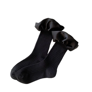 Black mid-calf socks with vertical knit texture and elegant satin ruffled trim edges
