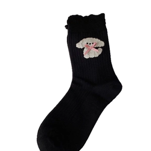 Cute black crew socks with puppy embroidery, bow detail and ruffled lace trim cuffs