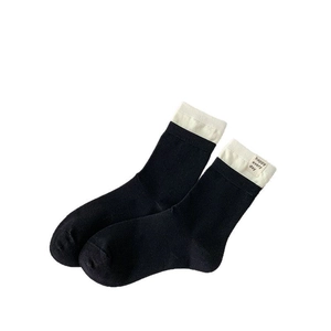 Japanese style black crew socks with white ruffled cuffs and Happy Every Day embroidery