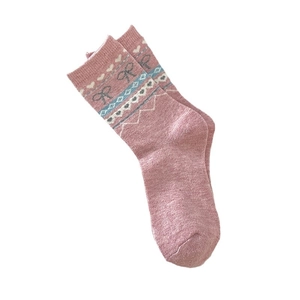 Chaussettes roses en laine Fair Isle avec motifs de coeurs et noeuds en jacquard
