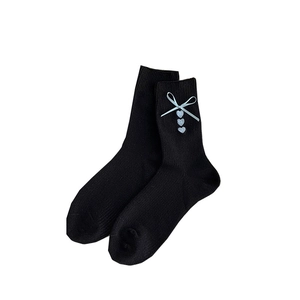 Japanese style black crew socks featuring blue ribbons and heart embroidery details