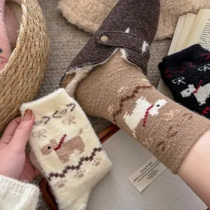 Close-up of soft thermal plush socks featuring cute dog patterns and bowknot details