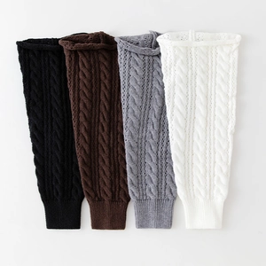 Chic cable knit leg warmers in black, brown, grey, and cream colors for autumn winter