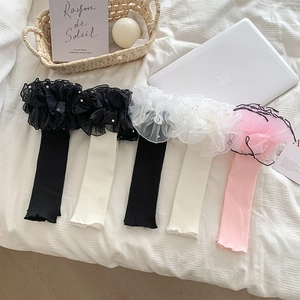 Lolita leg warmers with organza ruffles and pearls in black, white, and pink colors