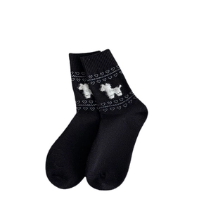 Japanese style black crew socks featuring cute white puppy and heart pattern details