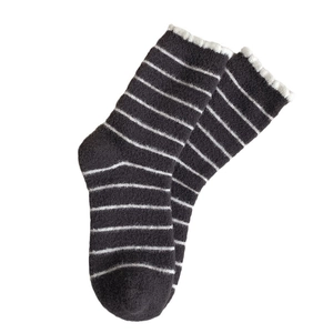 Thick black and white striped plush thermal socks with cute ruffled edges on white background