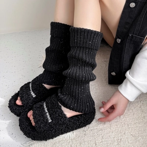 Japanese style black ribbed knit leg warmers with dot pattern and plush slippers