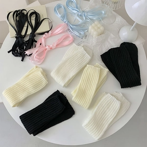 Vertical ribbed ballet-style knit leg warmers with silk ribbons in multiple colors