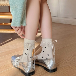 Japanese style cream lace trim socks with black heart pattern and bow detail
