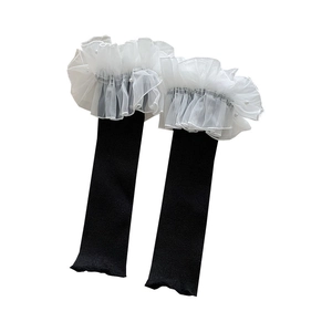 Lolita style black knit leg warmers with white organza ruffles and pearl beads