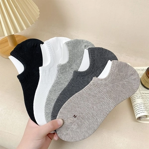 Detailed set of five breathable cotton invisible socks in black, white and grey tones