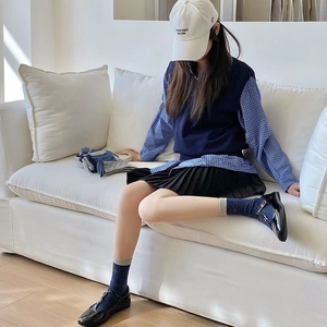 Detail view of Japanese vintage lace socks in dark blue with relief wave texture for women