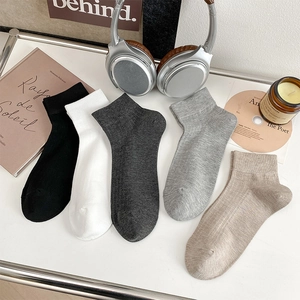 Five pairs of men's breathable low-cut cotton mesh socks in neutral solid colors