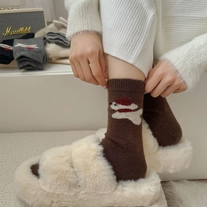 Winter wool socks for women featuring a cute polar bear pattern in deep brown knit