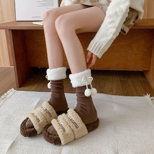 Plush brown slippers with matching pom-pom socks for winter fashion, cozy Lolita style