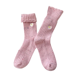 Pink wool-blend crew socks featuring embroidery heart, golden bow, and ruffled cuffs