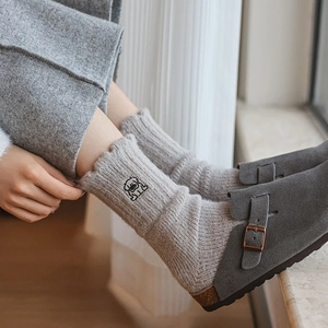 Warm gray thermal socks with cute dog embroidery and stylish wavy cuffs for winter