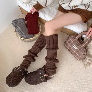 Thick ribbed knit leg warmers for women in dark brown, grey, and burgundy colors