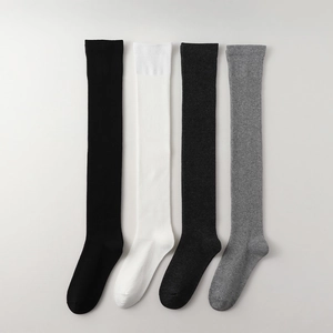 Knee-high ribbed socks in black, white, and grey with minimalist Japanese academy style