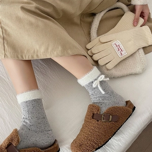Japanese style dot mink velvet socks with faux fur trim and bow detail for winter
