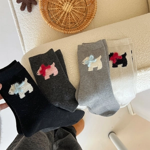 Close-up of wool crew socks with cute cartoon puppy embroidery and 3D bows in 4 colors