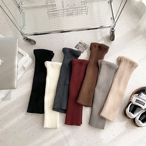 Ribbed knit leg warmers for women in seven colors including black white and grey