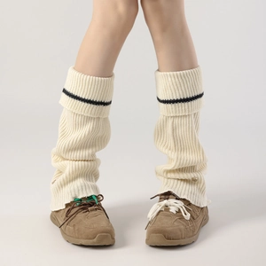 Chic cream knit leg warmers with black stripes and metal buttons for winter fashion