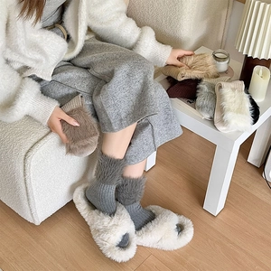 Detail of warm mink fleece patchwork socks with plush lining for winter comfort