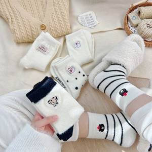 Thick warm winter socks with cute animal embroidery and soft coral fleece texture