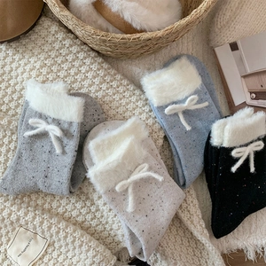 Japanese style dot yarn socks with faux fur trim and cute bows in four soft colors