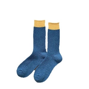 Thick wool socks for men in dark blue with yellow contrast trim for autumn winter