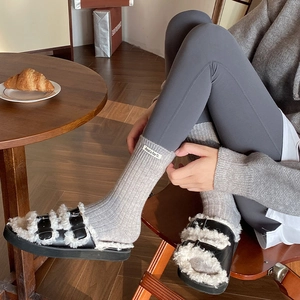 Winter thermal grey ribbed crew socks with fuzzy lined buckled slippers for cozy indoor use