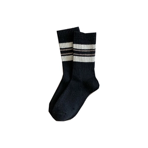 Thick wool blend striped socks in black for women featuring a classic varsity college style