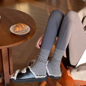 Winter heart pattern wool socks with thick thermal knit and stylish fleece slippers