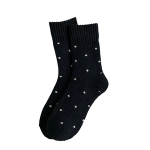 Thick wool socks for women with retro polka dots and ribbed cuffs for winter warmth