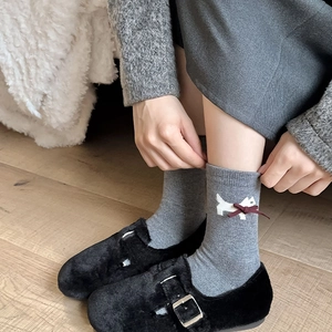Gray cashmere blend crew socks with white terrier pattern and red silk bow detail