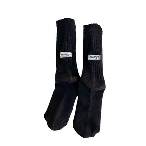 Thick black knitted mid-calf socks with letter embroidery for winter warmth