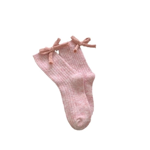 Sweet light pink wool blend knit socks for women featuring cute bows and ribbed texture