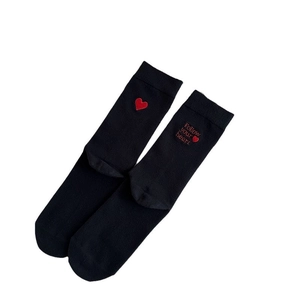 Black knit cotton crew socks with red heart embroidery and Follow your heart text