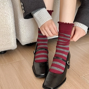 Vintage red and grey striped mid-calf socks with ruffle trim and bow detail in leather shoes