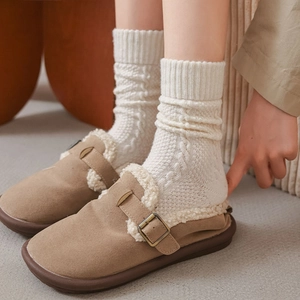 Brown suede mule slippers with warm shearling lining and stylish metal side buckle detail