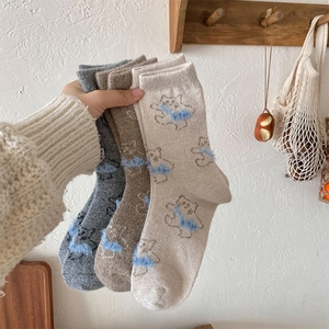 Detailed close-up of 3-pack cute cartoon cat socks with soft plush 3D fuzzy accents