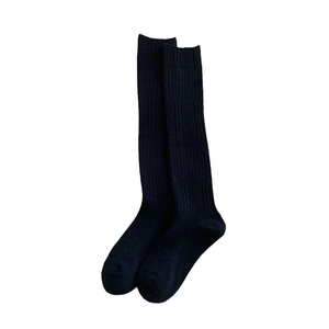 Women's vertical striped black knee-high socks in thick ribbed knit for autumn winter