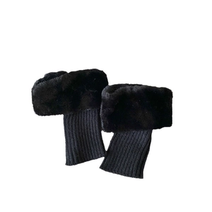 Japanese style black ribbed knit leg warmers with faux fur trim for boots styling