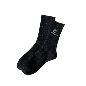 Thick black wool knit socks with sparkling rhinestones and embroidered logo details