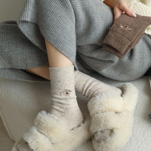 Thick wool socks for women with cute dog embroidery and warm knitted texture