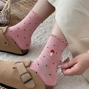 Pink ruffle socks with black polka dots and mushroom embroidery for a cute style