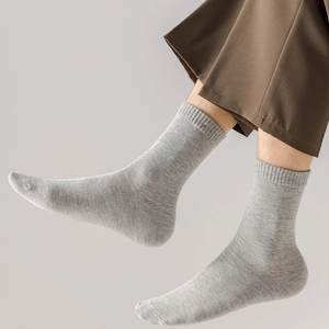 Detail of grey ribbed crew socks for men showing the knit texture and comfortable elastic cuff