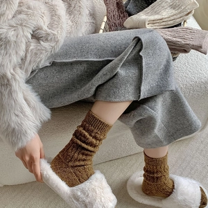 Thick warm cable knit wool socks for winter with rib textures in assorted earthy tones